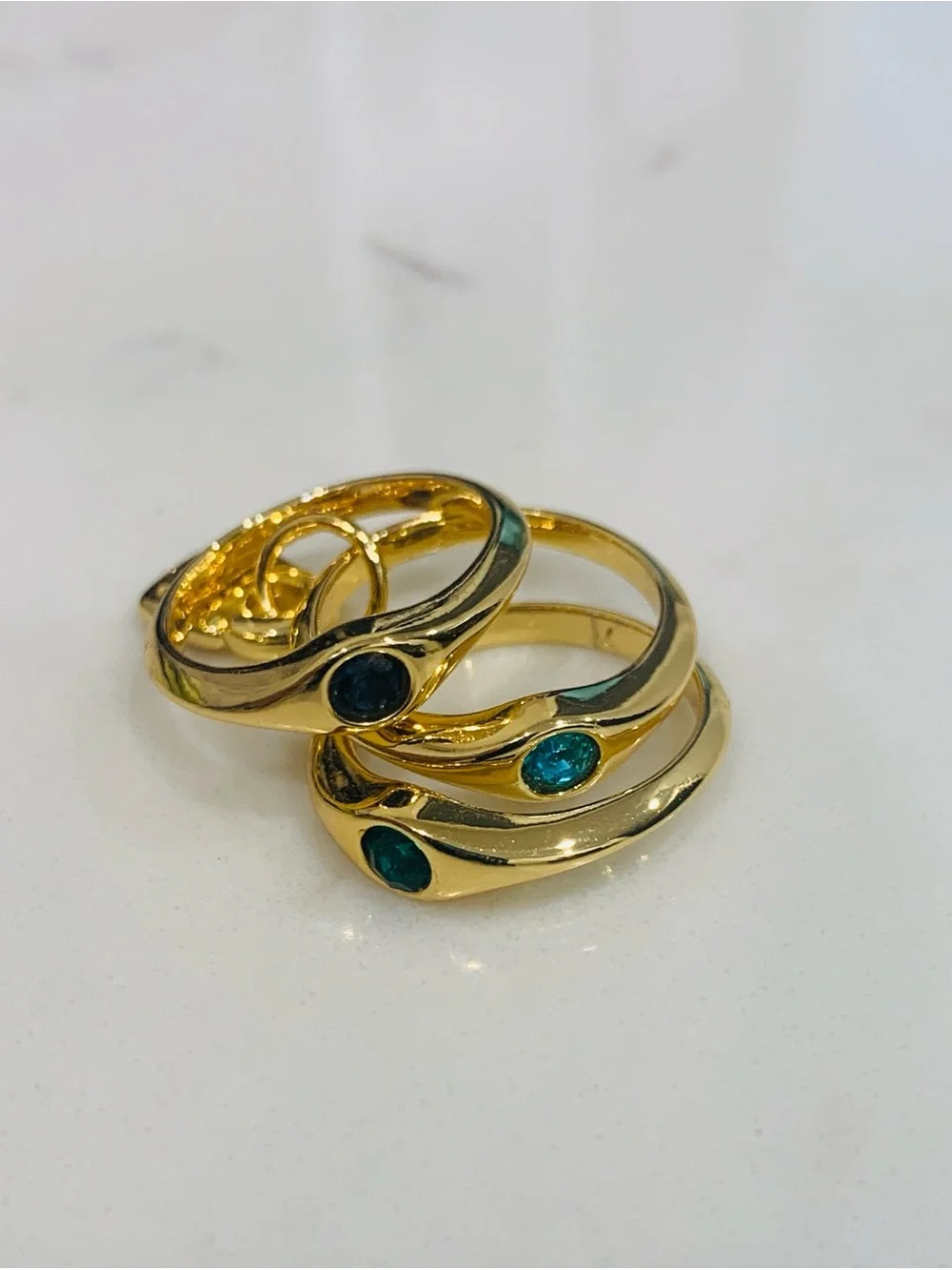 Gold Triple Stack Ring with Blue and Teal Gem Accents